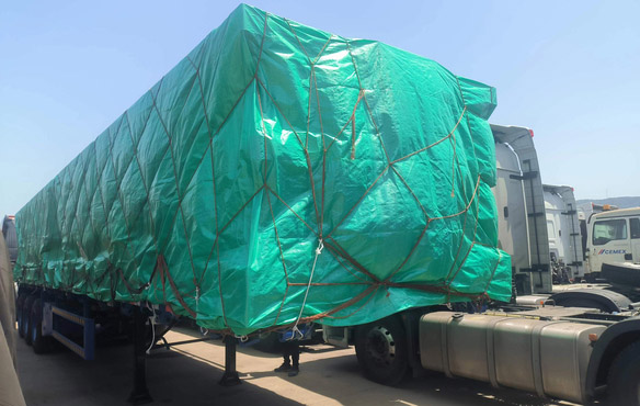 Side dump trailer for shipment Side dump trailer for shipment