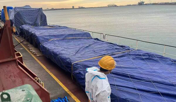 Lowboy trailer for shipment Lowboy trailer for shipment